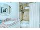 Updated bathroom with granite vanity and tub shower at 1801 Gulf N Dr # 275, Bradenton Beach, FL 34217