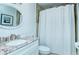 Clean bathroom with granite countertop and shower/tub combo at 1801 Gulf N Dr # 275, Bradenton Beach, FL 34217