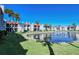 Condo community with pond, fountain, and lush landscaping at 1801 Gulf N Dr # 275, Bradenton Beach, FL 34217