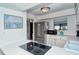 Modern kitchen with stainless steel appliances and white cabinetry at 1801 Gulf N Dr # 275, Bradenton Beach, FL 34217