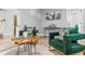 Comfortable living room with chic furniture, wood-look flooring, and tasteful decor at 807 E Genesee St, Tampa, FL 33603