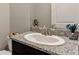 Bathroom with granite countertop and modern sink and faucet at 404 158Th E St, Bradenton, FL 34212
