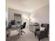 Home office with desk, comfortable chair, and plenty of natural light at 404 158Th E St, Bradenton, FL 34212