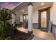 Inviting front porch with rocking chairs and a stone accent at 404 158Th E St, Bradenton, FL 34212