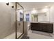 Elegant bathroom with double vanity, soaking tub, and walk-in shower at 404 158Th E St, Bradenton, FL 34212