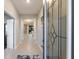 Bright and spacious entryway with tile floors and a view to the living area at 404 158Th E St, Bradenton, FL 34212