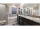 Spa-like bathroom featuring a double vanity and a large soaking tub at 404 158Th E St, Bradenton, FL 34212