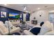 Bright living room featuring comfortable sofas, a large TV, and stylish decor at 404 158Th E St, Bradenton, FL 34212