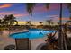 Resort-style community pool with plenty of seating at 404 158Th E St, Bradenton, FL 34212