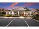 Community clubhouse with covered patio and parking at 404 158Th E St, Bradenton, FL 34212