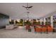 Relaxing community patio with seating and a bar at 404 158Th E St, Bradenton, FL 34212