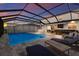 Expansive pool area with a covered patio and bar at 404 158Th E St, Bradenton, FL 34212