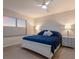 Spacious main bedroom with a king-size bed and beautiful sunset view at 404 158Th E St, Bradenton, FL 34212