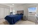 Cozy bedroom with a double bed, window, and plenty of closet space at 404 158Th E St, Bradenton, FL 34212