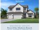 Modern farmhouse style home with three-car garage at 2533 Waterfront Cir, Sarasota, FL 34240