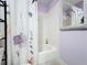 Clean bathroom with shower/tub combo, tile surround, and floral shower curtain at 4020 Murdock Ave, Sarasota, FL 34231