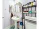 Bathroom with pedestal sink, toilet, and shower/tub combo at 4020 Murdock Ave, Sarasota, FL 34231