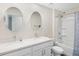 Main bathroom with double vanity, shower, and bathtub at 2966 Great Abaco Way, Bradenton, FL 34208