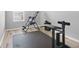 Home gym with inversion table, back extension bench and exercise mat at 2966 Great Abaco Way, Bradenton, FL 34208