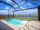 Relaxing screened pool with lake view at 2966 Great Abaco Way, Bradenton, FL 34208