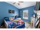 bedroom with twin bed, shelving, and playful decor at 14813 Skip Jack Loop, Lakewood Ranch, FL 34202
