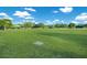 Green grassy park area with a pavilion at 14813 Skip Jack Loop, Lakewood Ranch, FL 34202