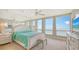 Main bedroom with ocean views and large windows at 1045 Gulf Of Mexico Dr # 403, Longboat Key, FL 34228