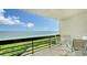 Balcony with patio furniture offering stunning ocean views at 1045 Gulf Of Mexico Dr # 403, Longboat Key, FL 34228