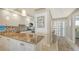 Modern kitchen with granite counters and breakfast bar at 1045 Gulf Of Mexico Dr # 403, Longboat Key, FL 34228