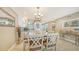 Spacious dining area with kitchen and entryway views at 1045 Gulf Of Mexico Dr # 403, Longboat Key, FL 34228