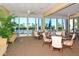 Bright and airy community room with comfortable seating and pool views at 1045 Gulf Of Mexico Dr # 403, Longboat Key, FL 34228