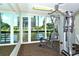 Fitness center with weight machine and mirror at 1045 Gulf Of Mexico Dr # 403, Longboat Key, FL 34228