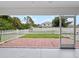 Screened patio overlooking the backyard at 2318 N Chamberlain Blvd, North Port, FL 34286