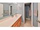 Bathroom has a single sink vanity, tiled floors, and private toilet at 11622 Summit Rock Ct, Parrish, FL 34219