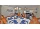 This expansive open-concept living space showcases a combined living and dining area perfect for Gathering gathering at 11622 Summit Rock Ct, Parrish, FL 34219