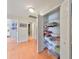 Walk-in pantry features custom shelving and is perfect for storage at 11622 Summit Rock Ct, Parrish, FL 34219