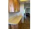 View of kitchen and living room at 3780 Lake Bayshore Dr # K-521, Bradenton, FL 34205