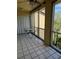 Private balcony with table and chairs at 3780 Lake Bayshore Dr # K-521, Bradenton, FL 34205