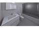 Modern bathroom featuring a soaking tub and double vanity at 2516 Browning St, Sarasota, FL 34237