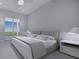 Large bedroom with a king-size bed and access to a balcony at 2516 Browning St, Sarasota, FL 34237