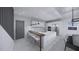 Modern kitchen with white cabinets and marble countertops at 2516 Browning St, Sarasota, FL 34237
