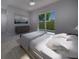 Comfortable bedroom with pool view and ample light at 2516 Browning St, Sarasota, FL 34237