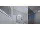 Modern bathroom with glass shower and floating vanity at 2516 Browning St, Sarasota, FL 34237