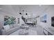 Open living room with modern furniture and kitchen views at 2516 Browning St, Sarasota, FL 34237