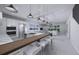 Modern kitchen with island and stainless steel appliances at 2516 Browning St, Sarasota, FL 34237