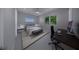 Bedroom with workspace and access to backyard at 2516 Browning St, Sarasota, FL 34237