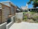 Backyard with exposed concrete blocks and a partial view of the building at 6831 Georgia Ave, Bradenton, FL 34207