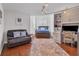 Spacious bedroom with a comfortable bed, built-in workspace, and hardwood floors at 1711 Starling Dr # 1711, Sarasota, FL 34231