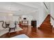 Elegant dining room featuring hardwood floors and a chandelier at 1711 Starling Dr # 1711, Sarasota, FL 34231