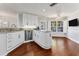 Modern kitchen with a breakfast nook and stainless steel appliances at 1711 Starling Dr # 1711, Sarasota, FL 34231